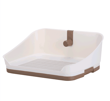 Portable dog potty training tray in medium brown color with sturdy wall for puppy toilet training.